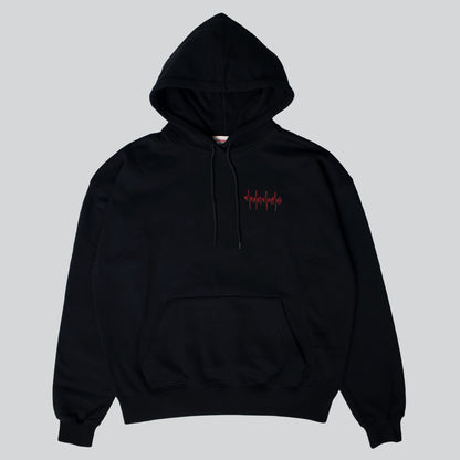 Black Big Heart hooded sweatshirt with red lifeline stitches on left chest, made from a comfortable cotton blend.