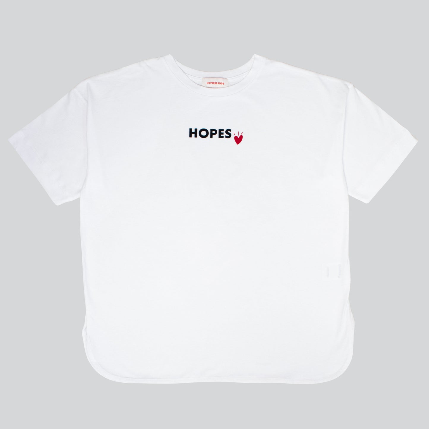 Product shot of Hopesbrands women's oversized white Cool Touch T-shirt, featuring a black flocked Hopes logo with a red heart on the chest, emphasizing comfort and breathability, for everyday wear.