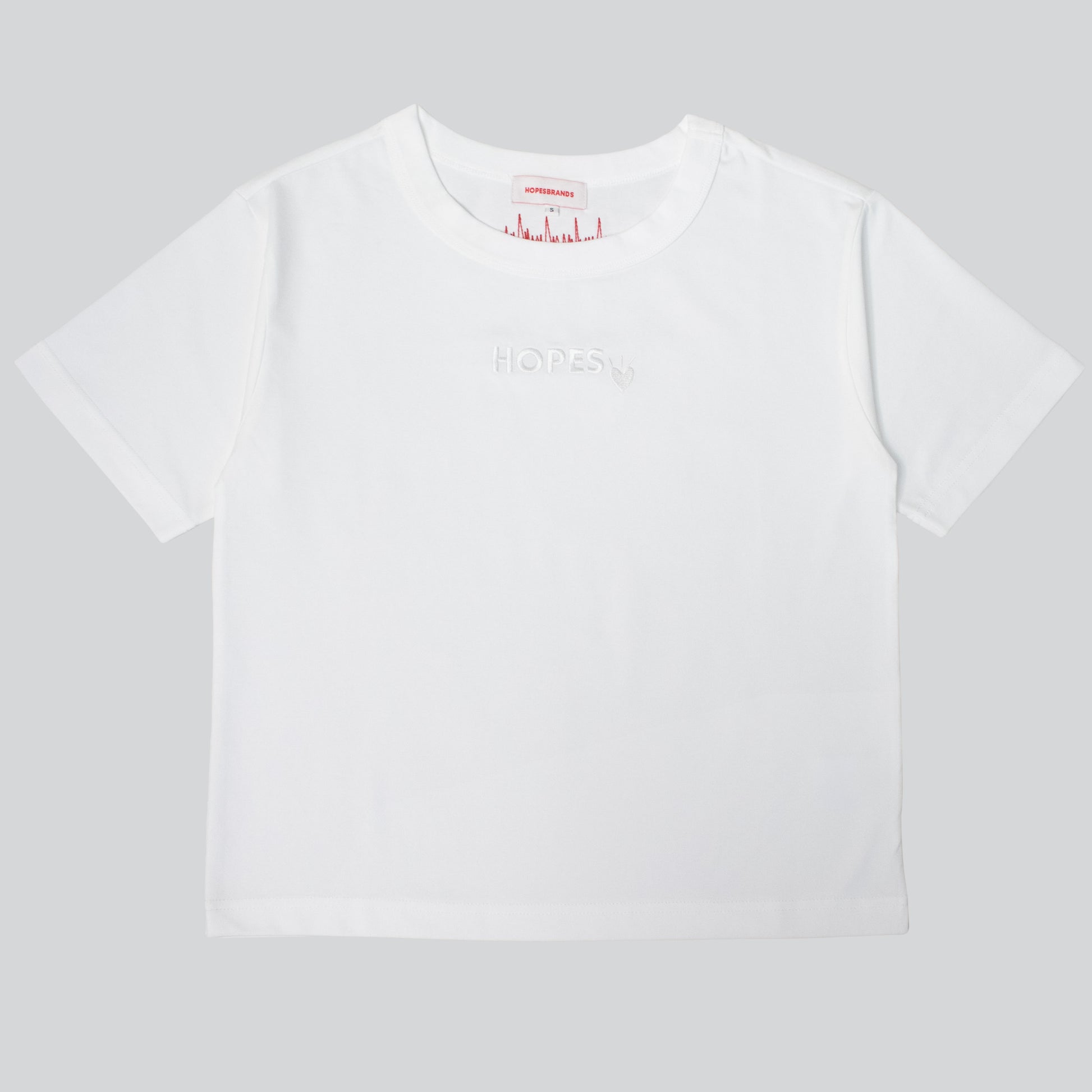 Product shot of Hopesbrands women's off-white tonal short sleeve T-shirt with a tone-on-tone embroidered 'Hopes' logo on the chest, showcasing its sleek, versatile design and timeless appeal.